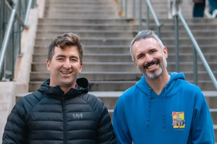 Ben Vinegar (right) with Modem co-founder Mike Clarke smile facing the camera.
