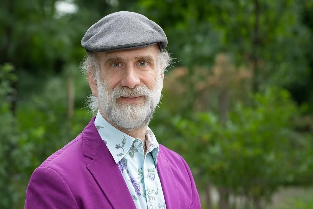 Bruce Schneier smiles facing the camera