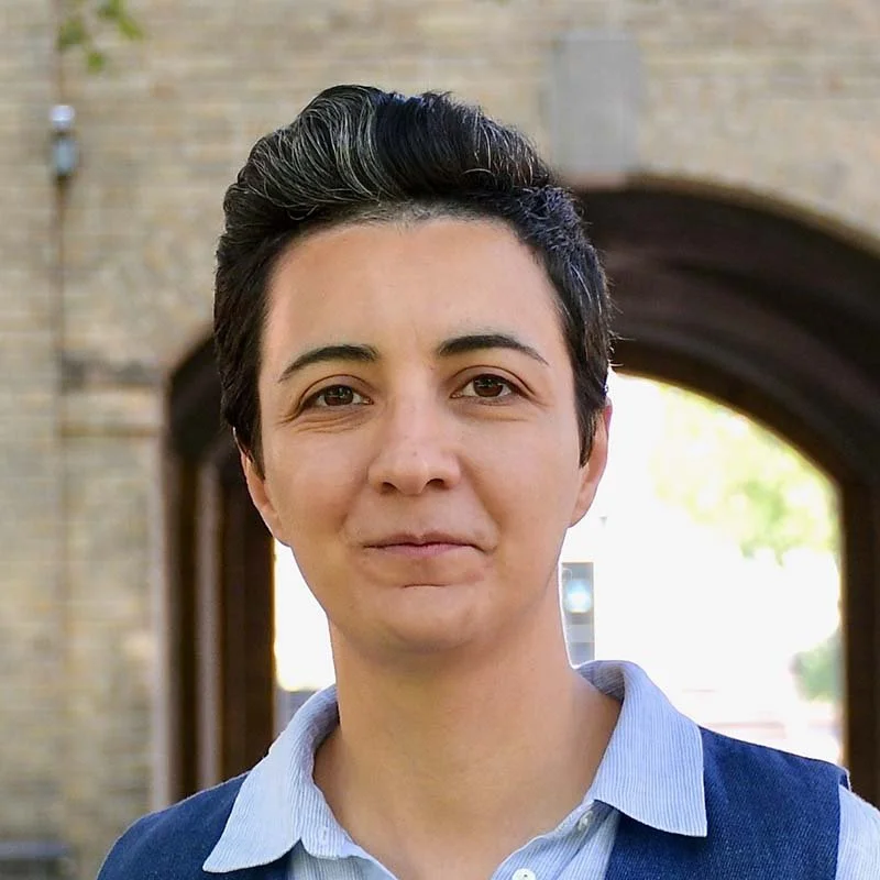 Bahar Aameri smiles facing the camera.
