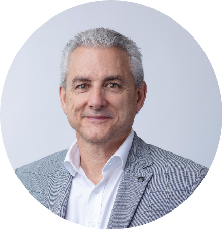 Martin Wildberger smiles facing the camera.