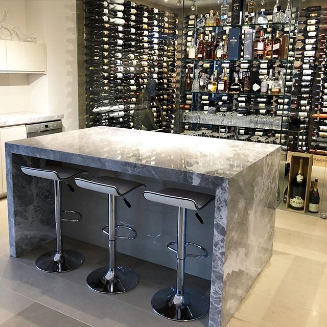 Our team layered ceramic coatings with our Countertop Protection Film to achieve full protection of this beautiful waterfall countertop. Contact us today to learn how you can protect your space from staining and etching.