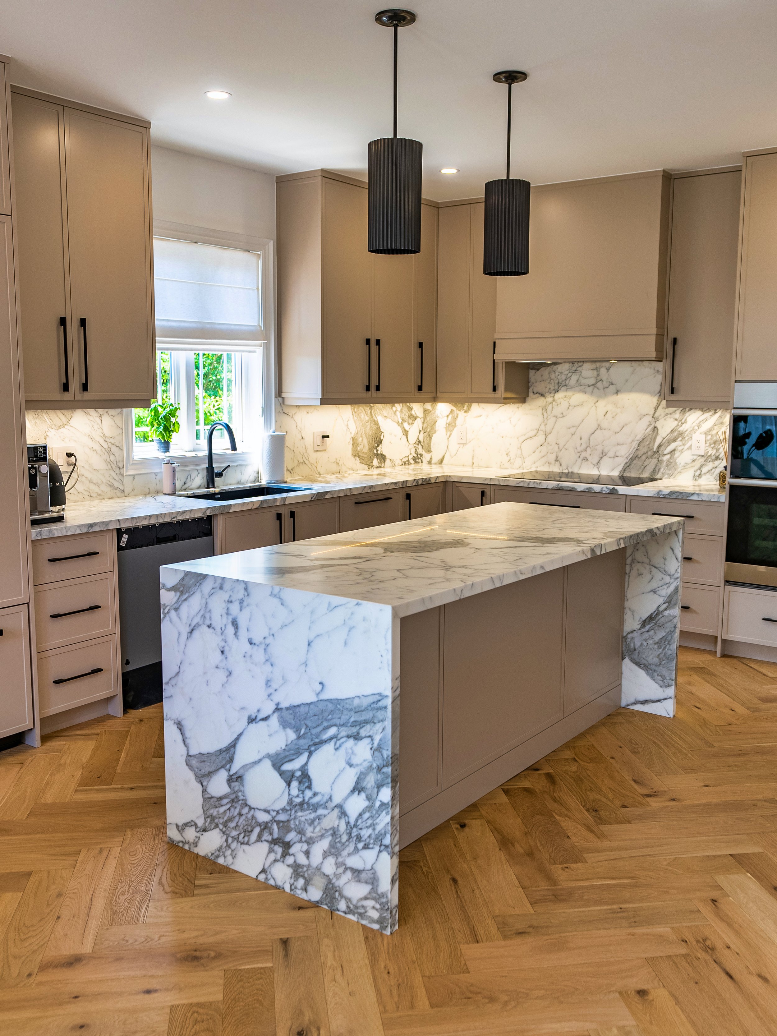  Timeless Calacatta Marble kitchen fully protected with honed PROSHIELD &amp;. Island, waterfalls, range, countertops &amp; side table. 