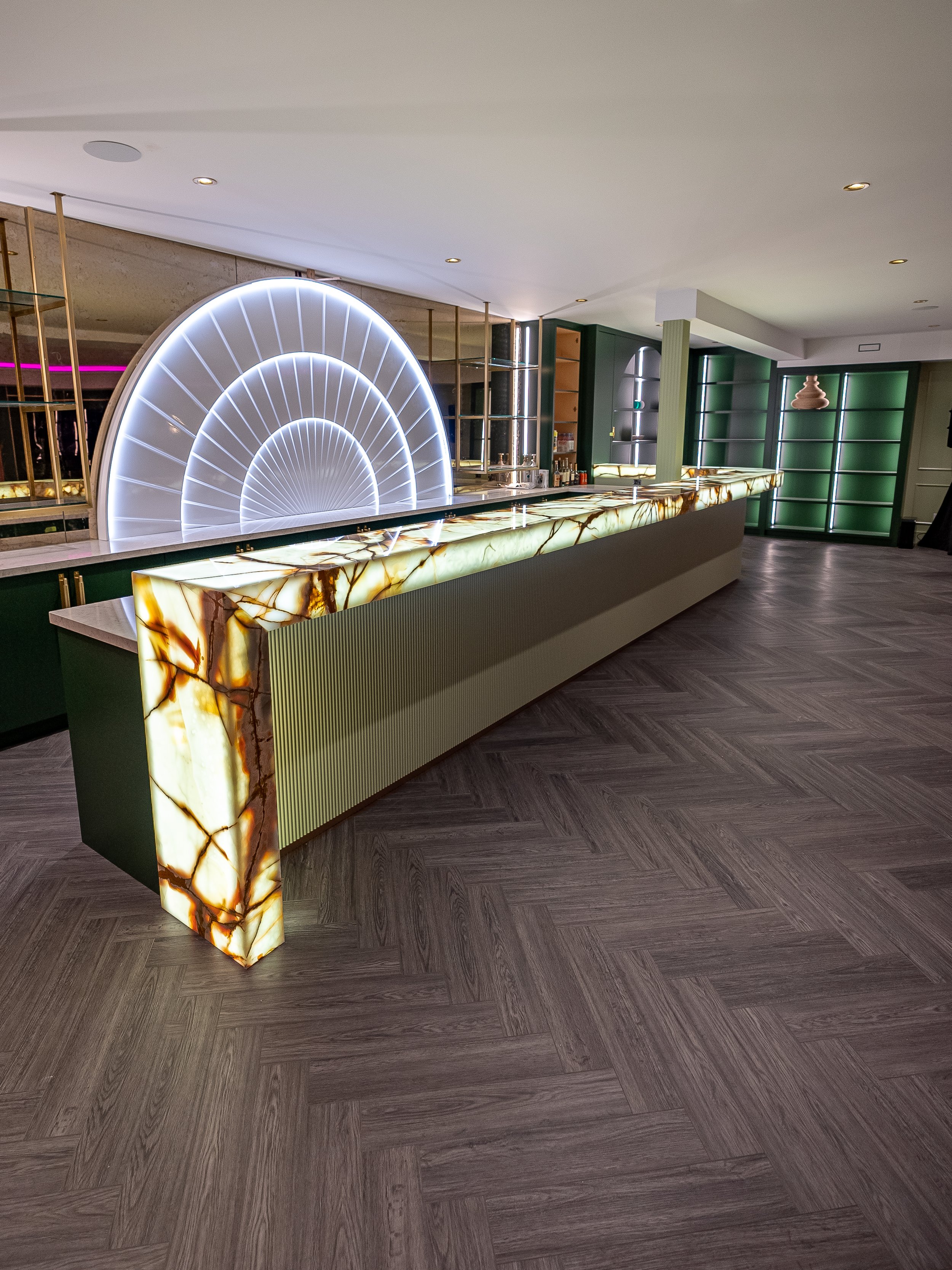  Backlit Onyx Bar &amp; Onyx vanity in this incredible Forest Hill basement bar is now fully preserved with polished PROSHIELD. All suede booths were also coated with our textile sealant. 