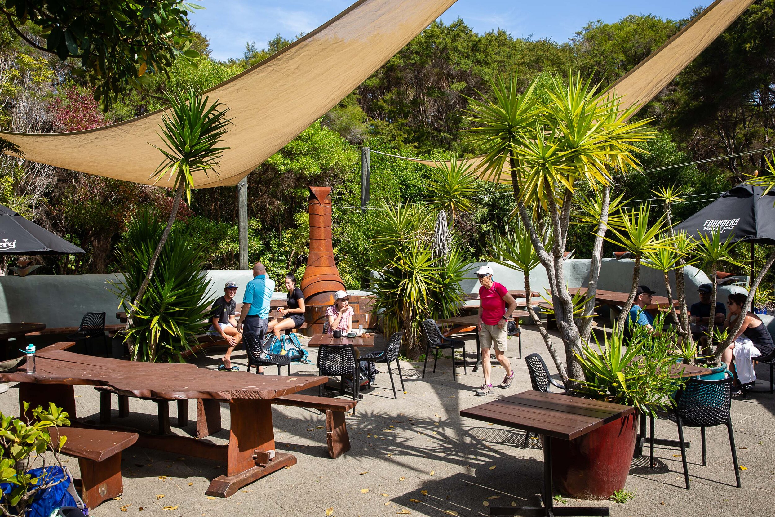 Awaroa Lodge courtyard dining.jpg