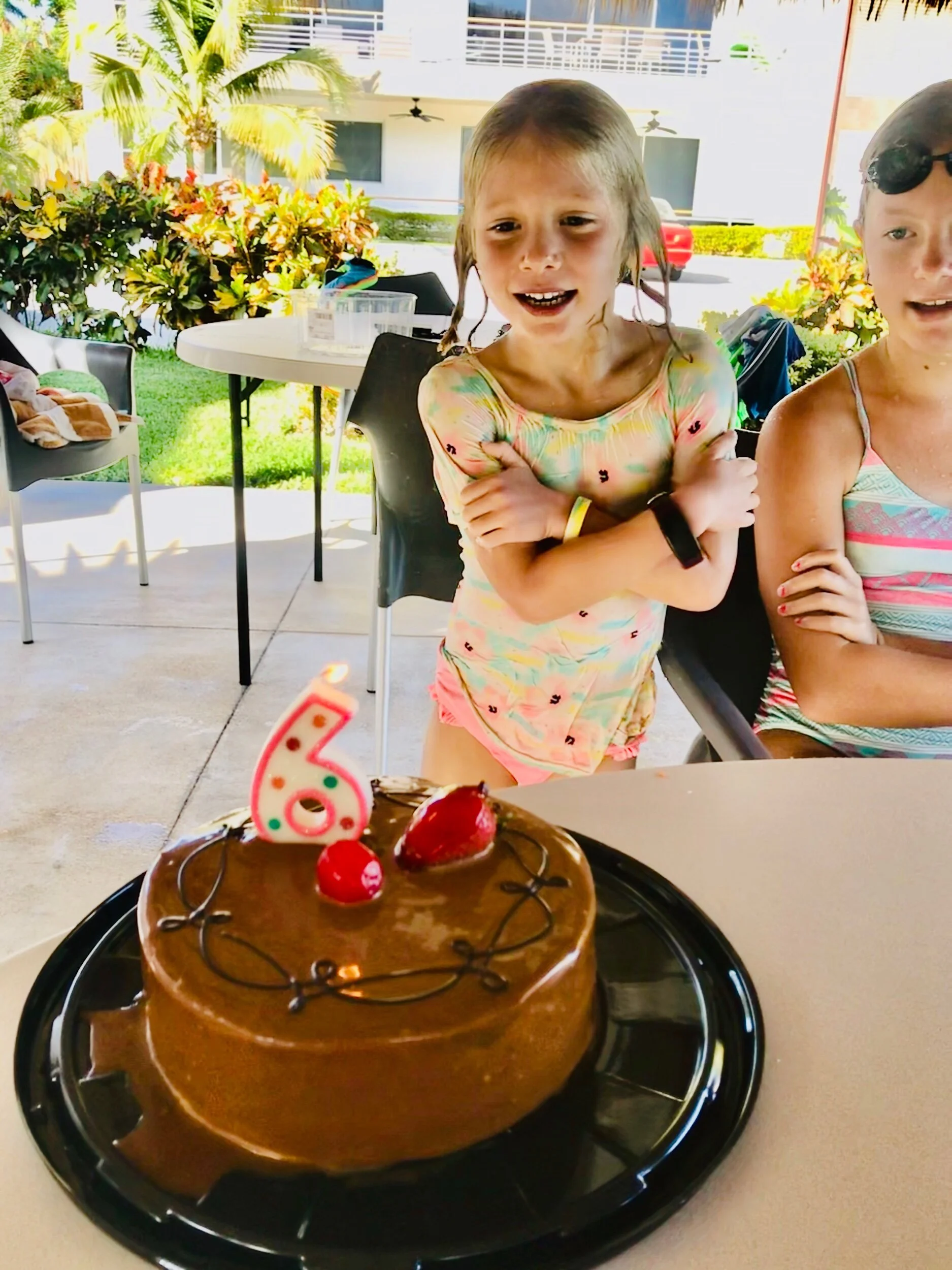 Madeline, staring in awe at her 6th Birthday cake!