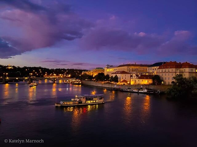 Over the romantic Vltava river in Prague at sunset - the lights on the river, the boat cruises floating softly by, all of the delicious restaurants over looking the water *sigh* Prague held such unexpected romance with it's old world charm, architect