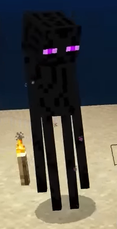 A tall, purple-eyed Enderman standing in a Minecraft desert at night, showcasing the game's famous blocky sandbox world.