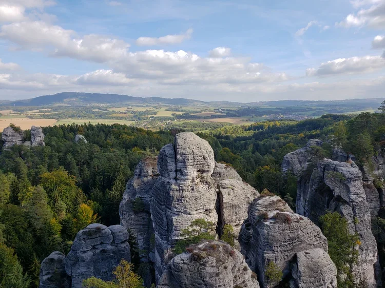 Massive sandstone rock pillars and "rock city" views near Hrubá Skála in Czech Paradise.