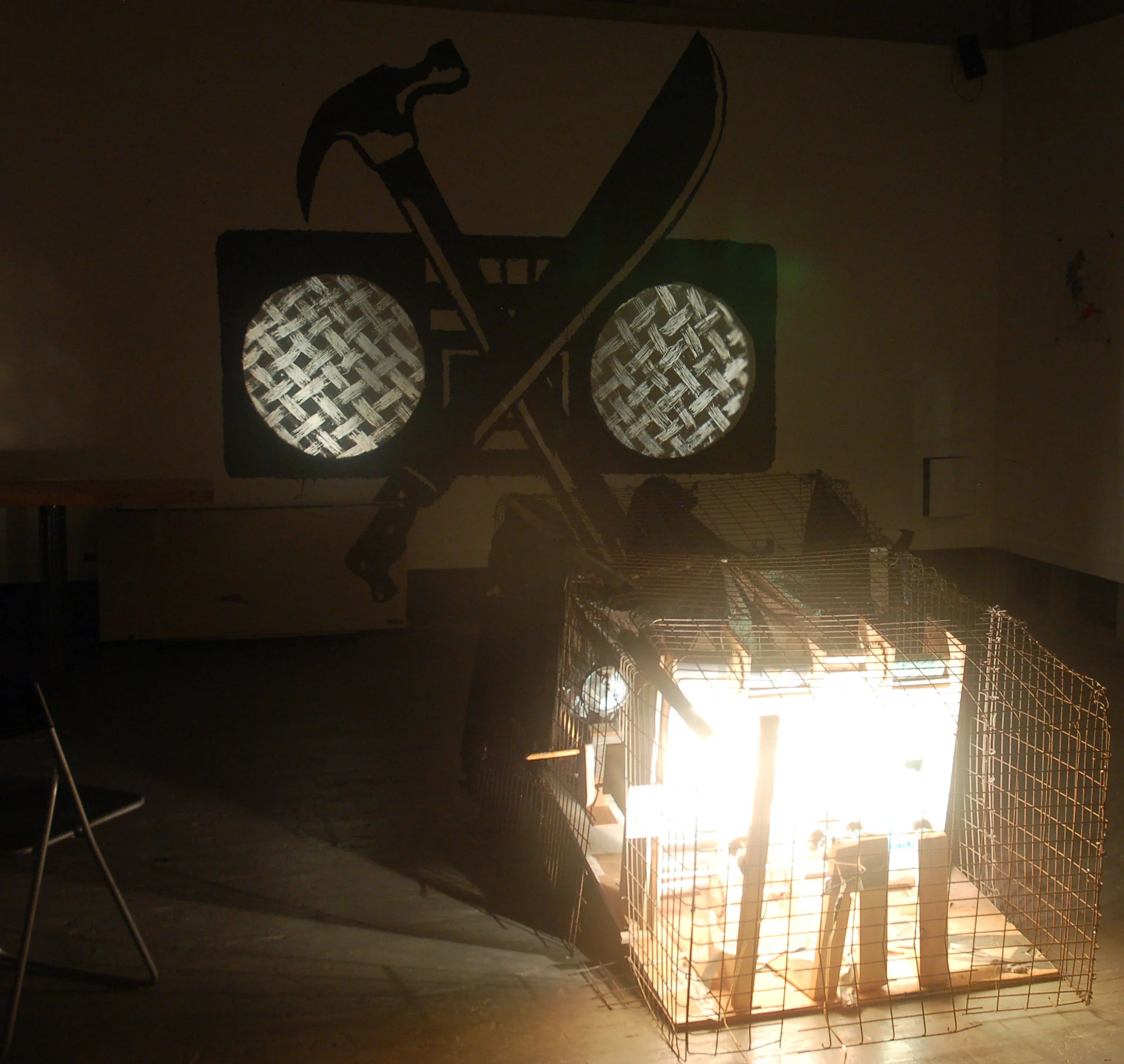   The Pixedigigiga-Crisis  Mixed media, projection onto painted emblem, 3’x3’x4’, 2010    