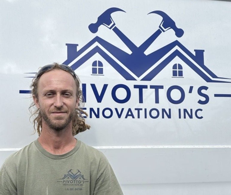 Man standing in front of a logo that features house rooftops and hammers, with the text "Pivotto's Innovation Inc."