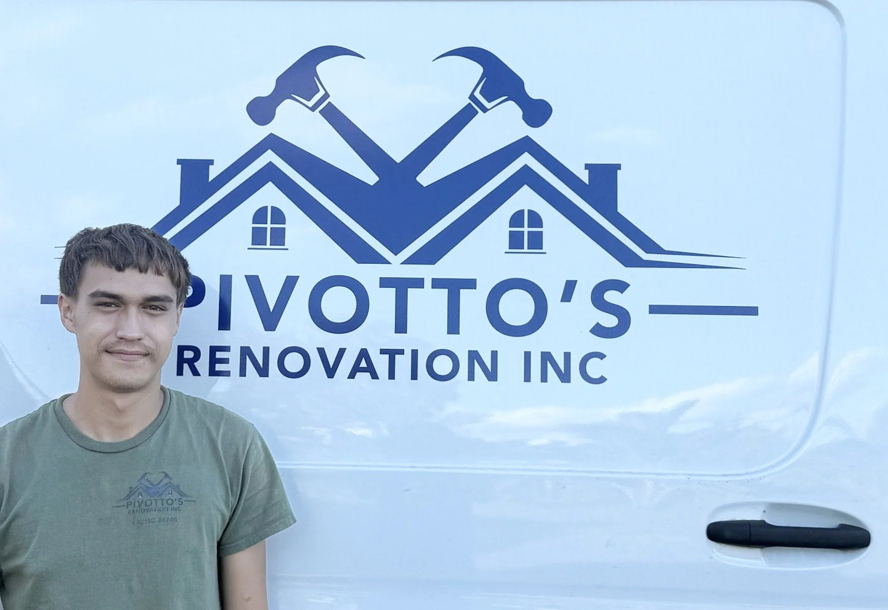 Young man standing in front of a white van with a blue logo reading 'Pivotto's Renovation Inc' featuring two houses and crossed hammers.
