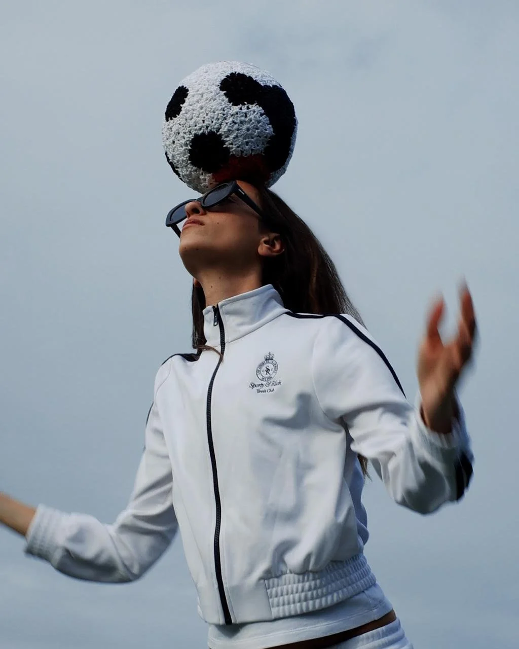 soccer ball football covered with crochet as a sculpture by Sophie Inard