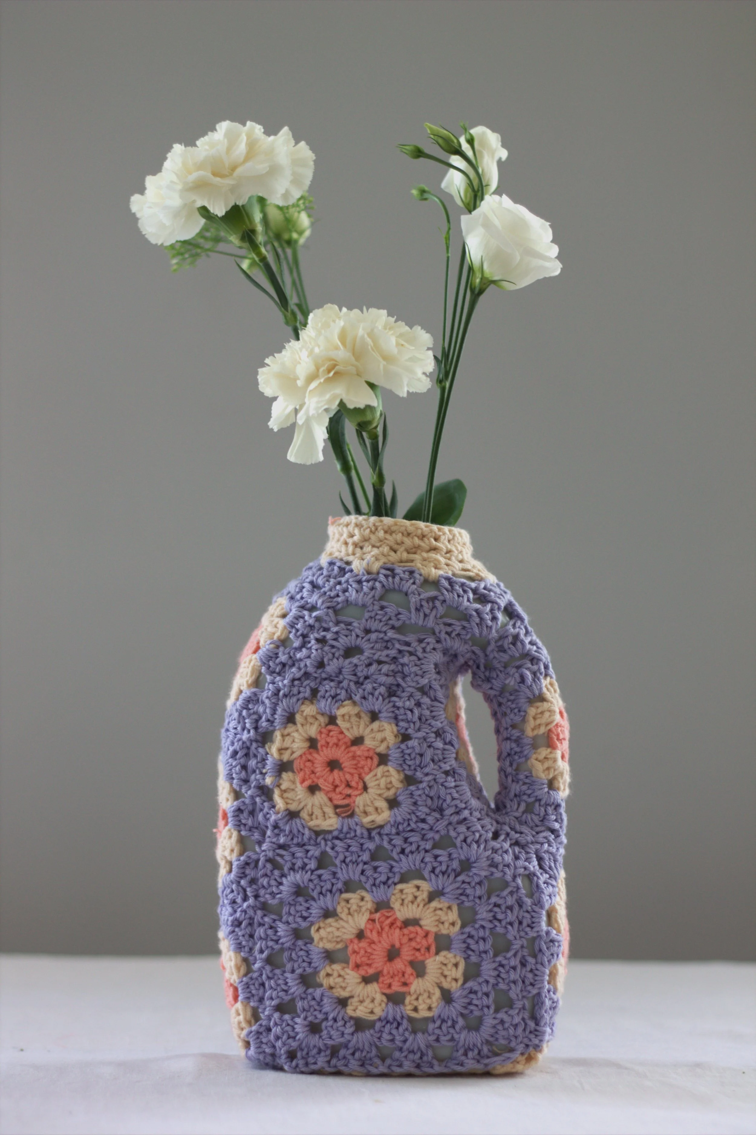 Vase bidon parme