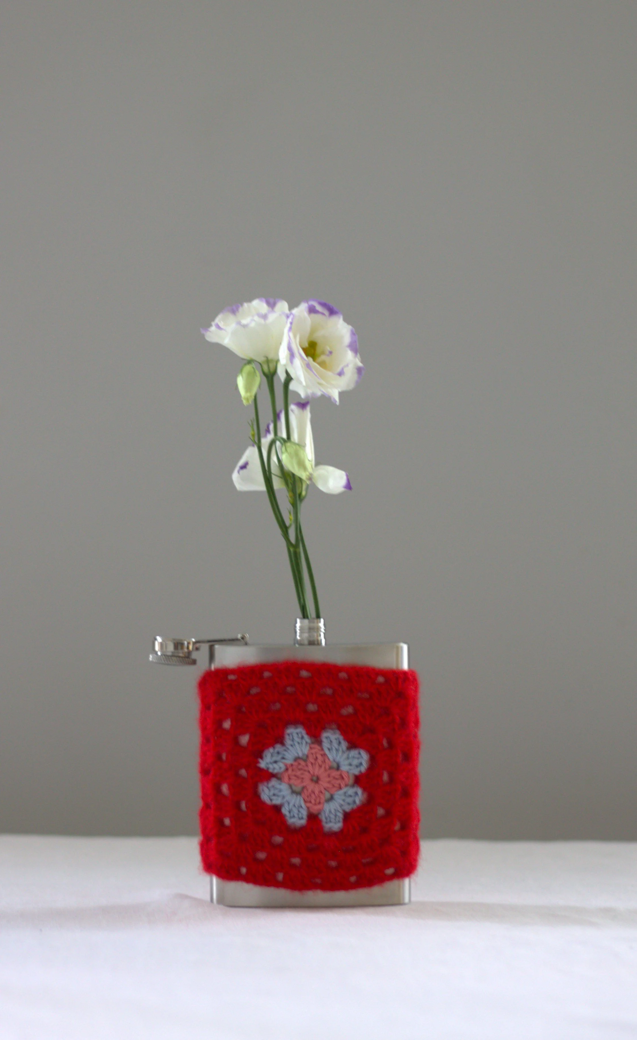 Vase ivre rouge