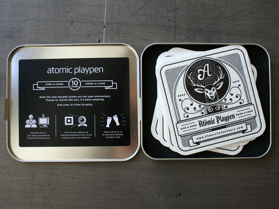 0001_atomic_playpen_coasters_metal_case_inside.jpg