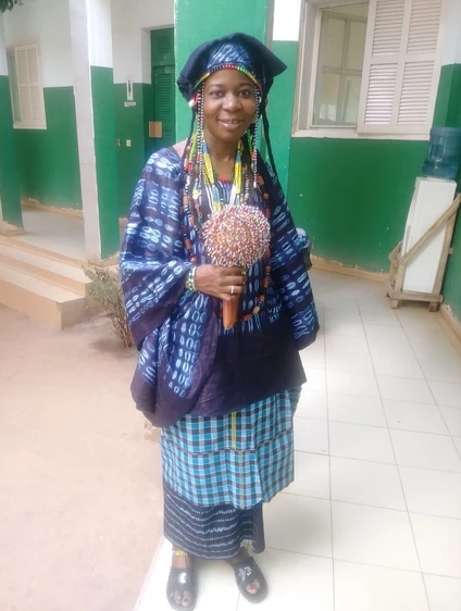  A MANDINKA NURSE.  One of the brightest and funniest nurse I have met. Every morning she comes to work dress in her tribe's traditional clothing. Then, all of a sudden you will see her transform into the Farafenni General Hospital uniforms and she i