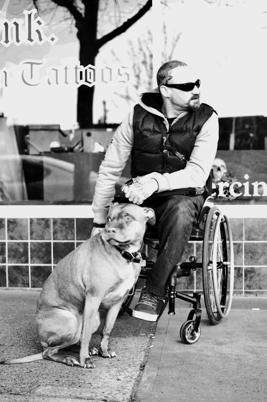 Jay and pal in front of his shop on Lonsdale