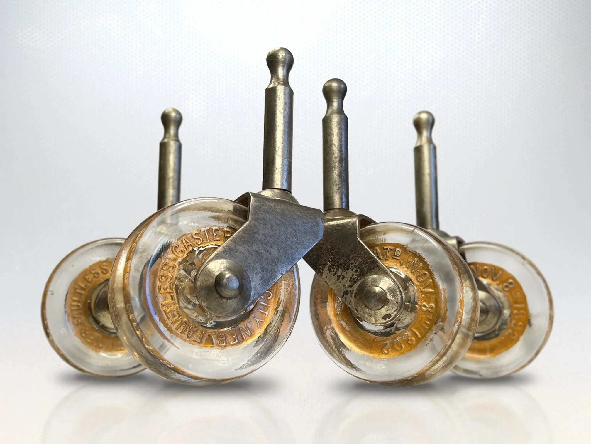 ANTIQUE GLASS FURNITURE CASTERS