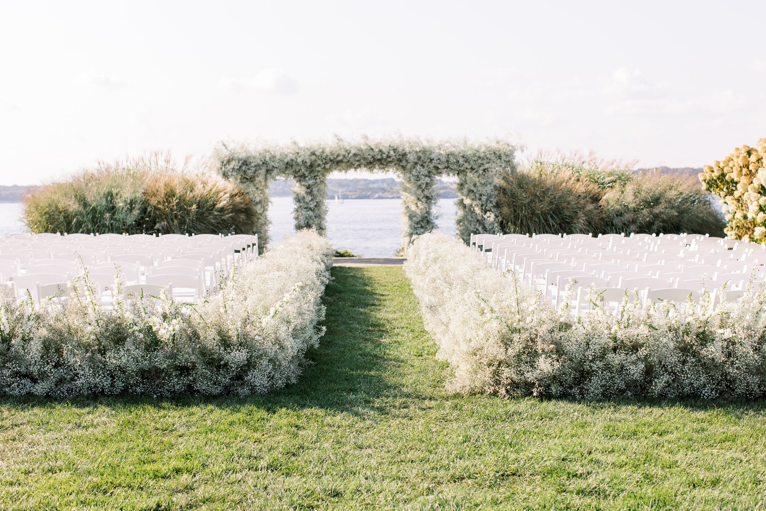 Ceremony with White Puffy Flowers