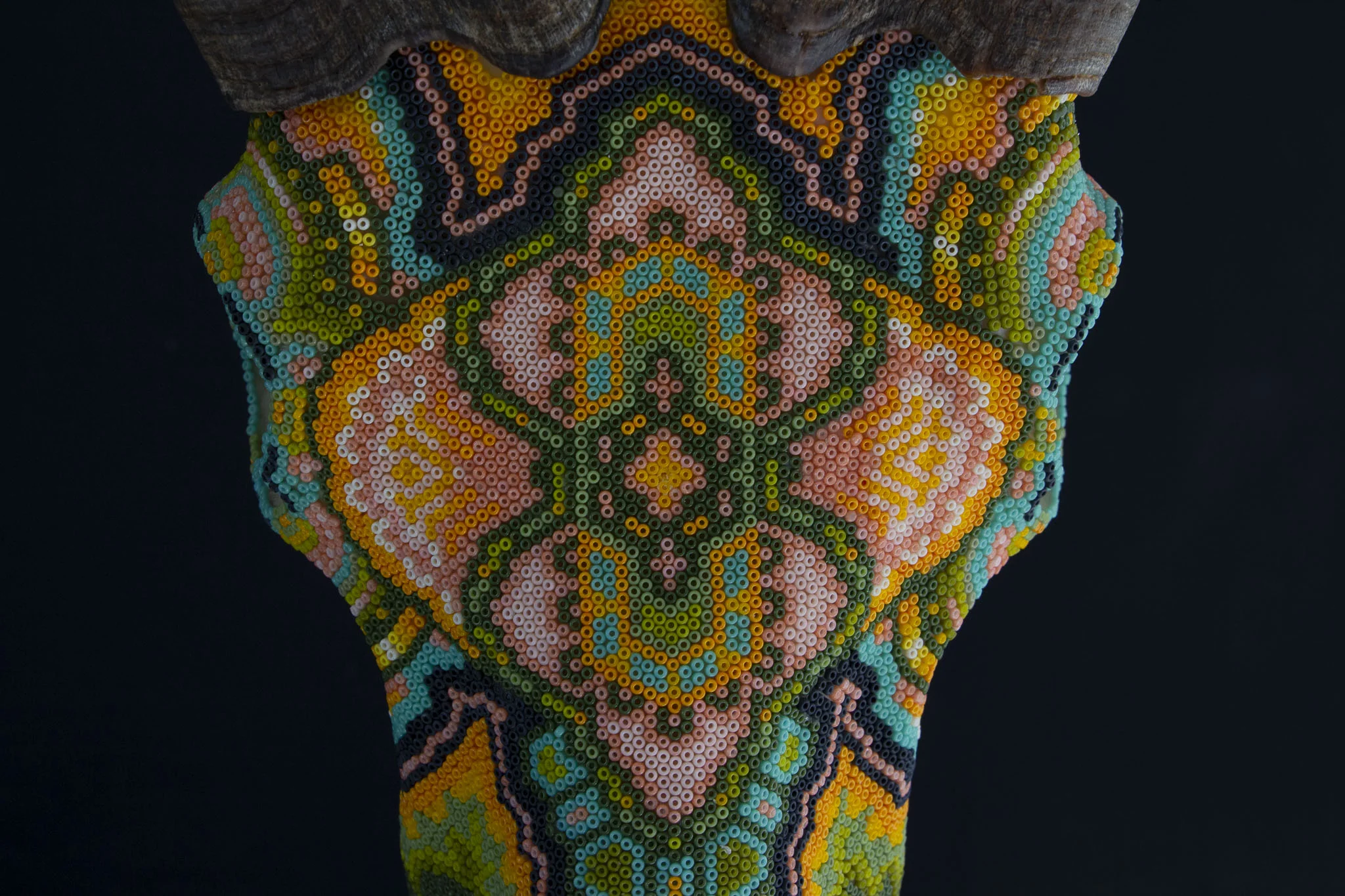  Central Medallion collides with radial eye patterns 