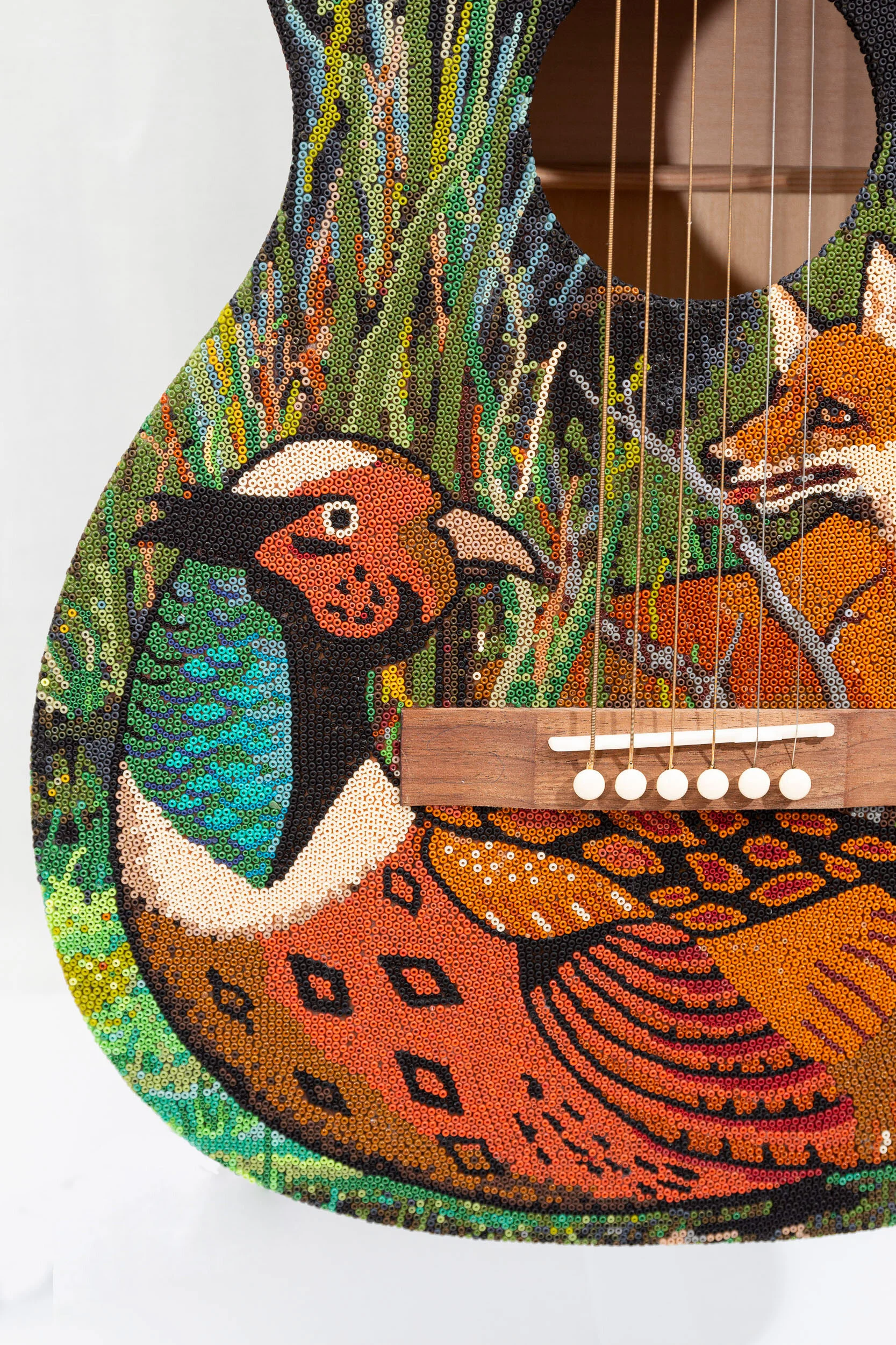  As for the art, I started this piece with the intention of doing a Nudie Cohn inspired western design. I started with this huge pheasant with those stunning tail feathers, I had no plan past the bird. Beading is such a slow process, it gives me time