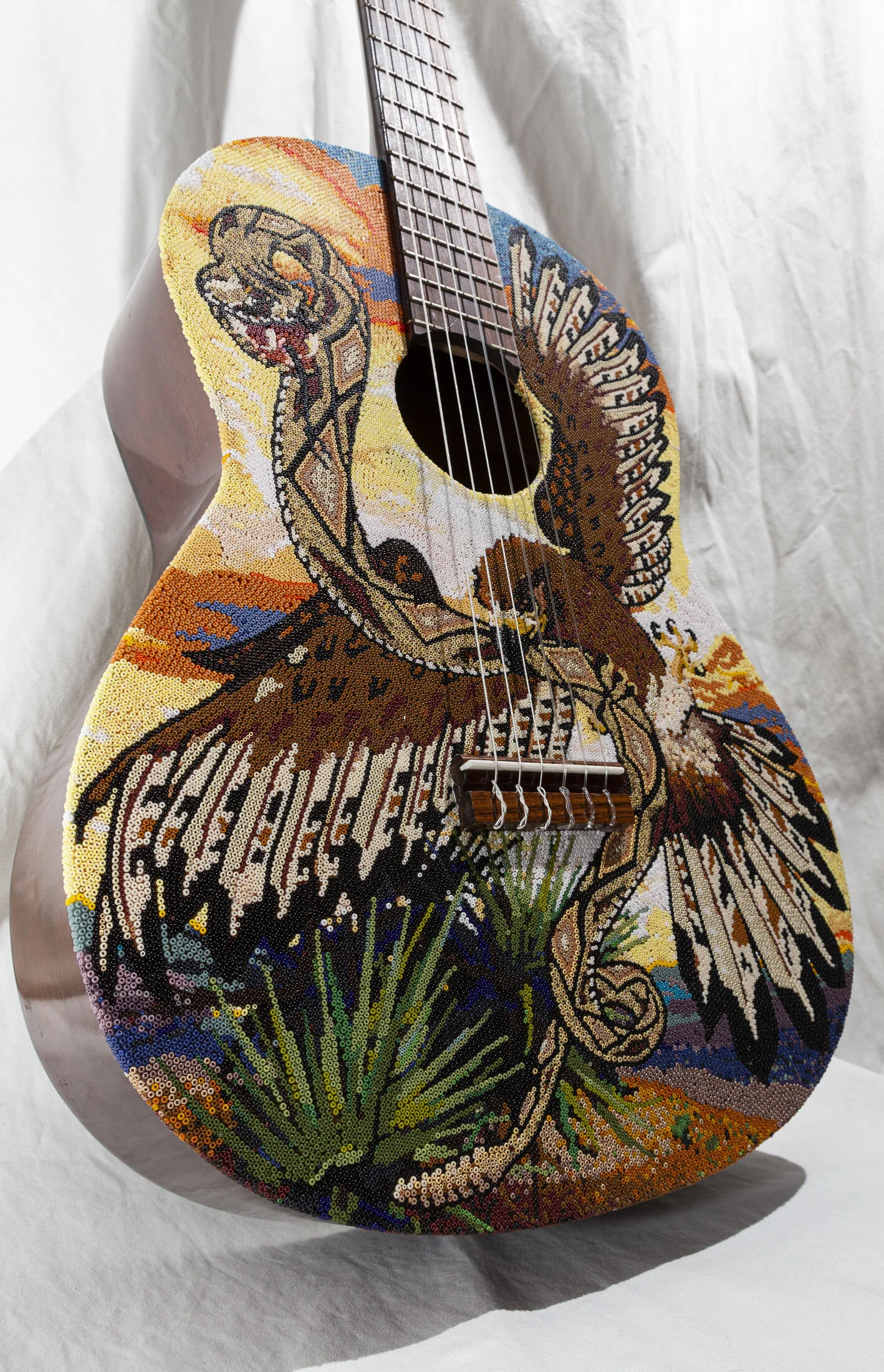  This guitar was found in an attack by my father-in-law. He gave it to me to use as a canvas. This guitar is the least functional guitar. there is some buzzing on the frets, it does not sound very good.  