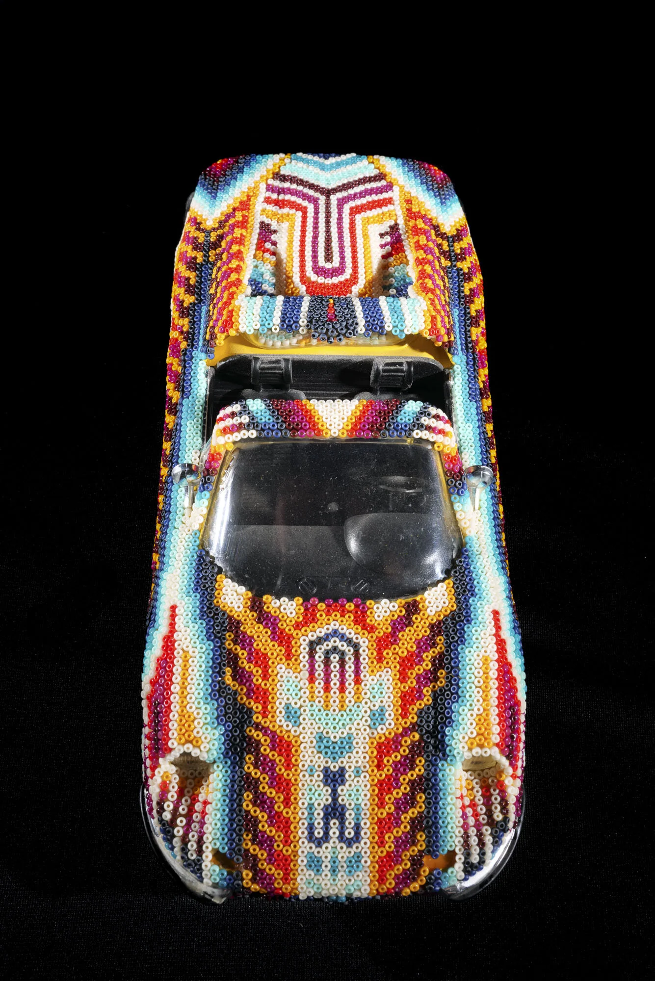  ‘Dino’ 2020  10” X 4” X 2.75”  Seed beads, beeswax, on diecast model car 