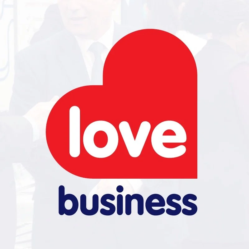 A logo with red and white hearts, the word 'love' inside the heart, and the word 'business' below in blue text.