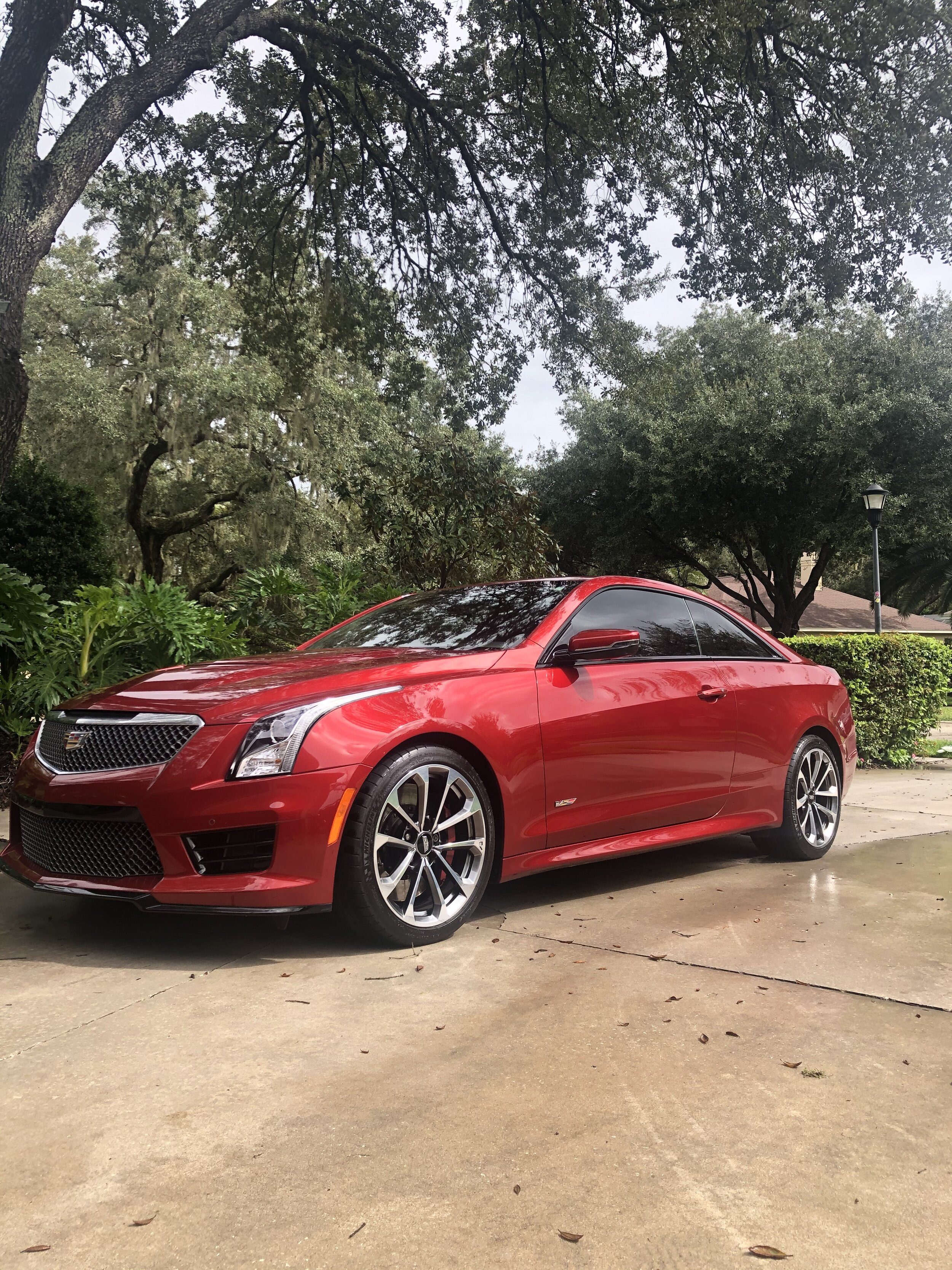 Mobile auto detailing service on a Cadillac ATS-V.