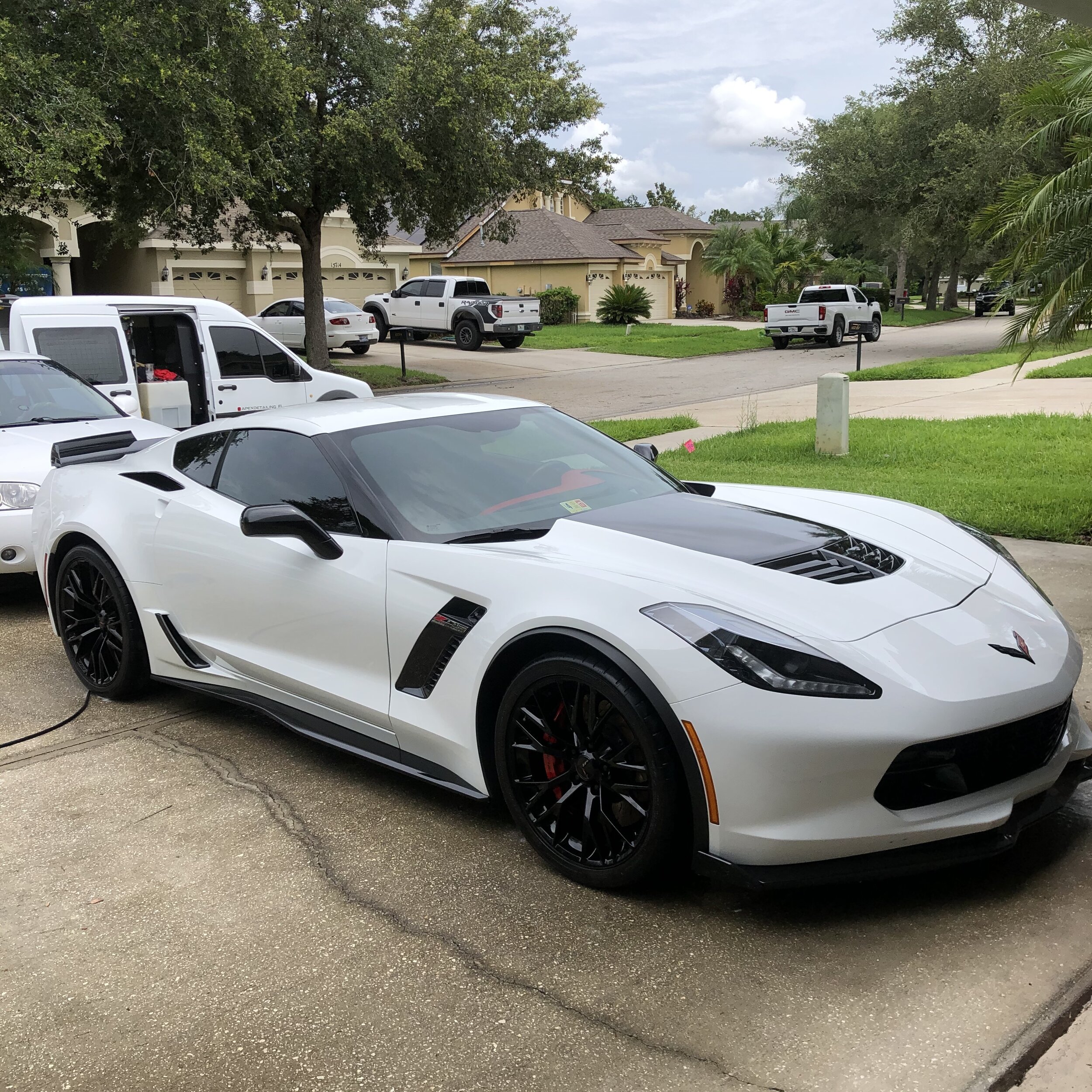 Mobile car detailing service on a Corvette.