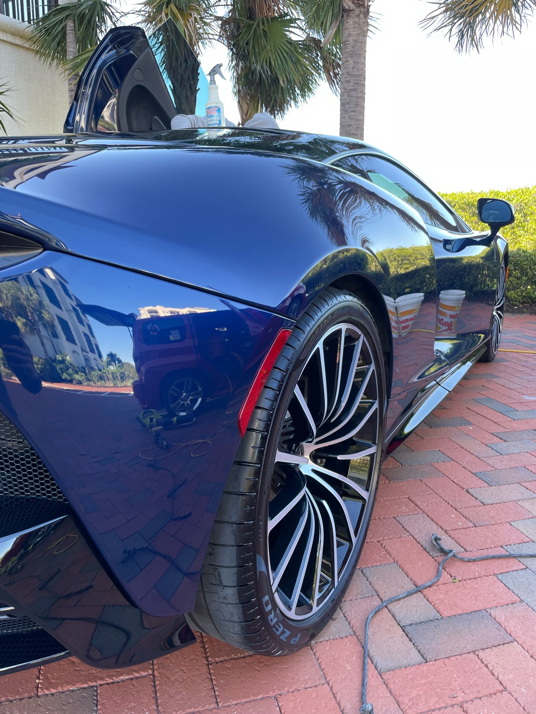 Auto detailing service on a McLaren.