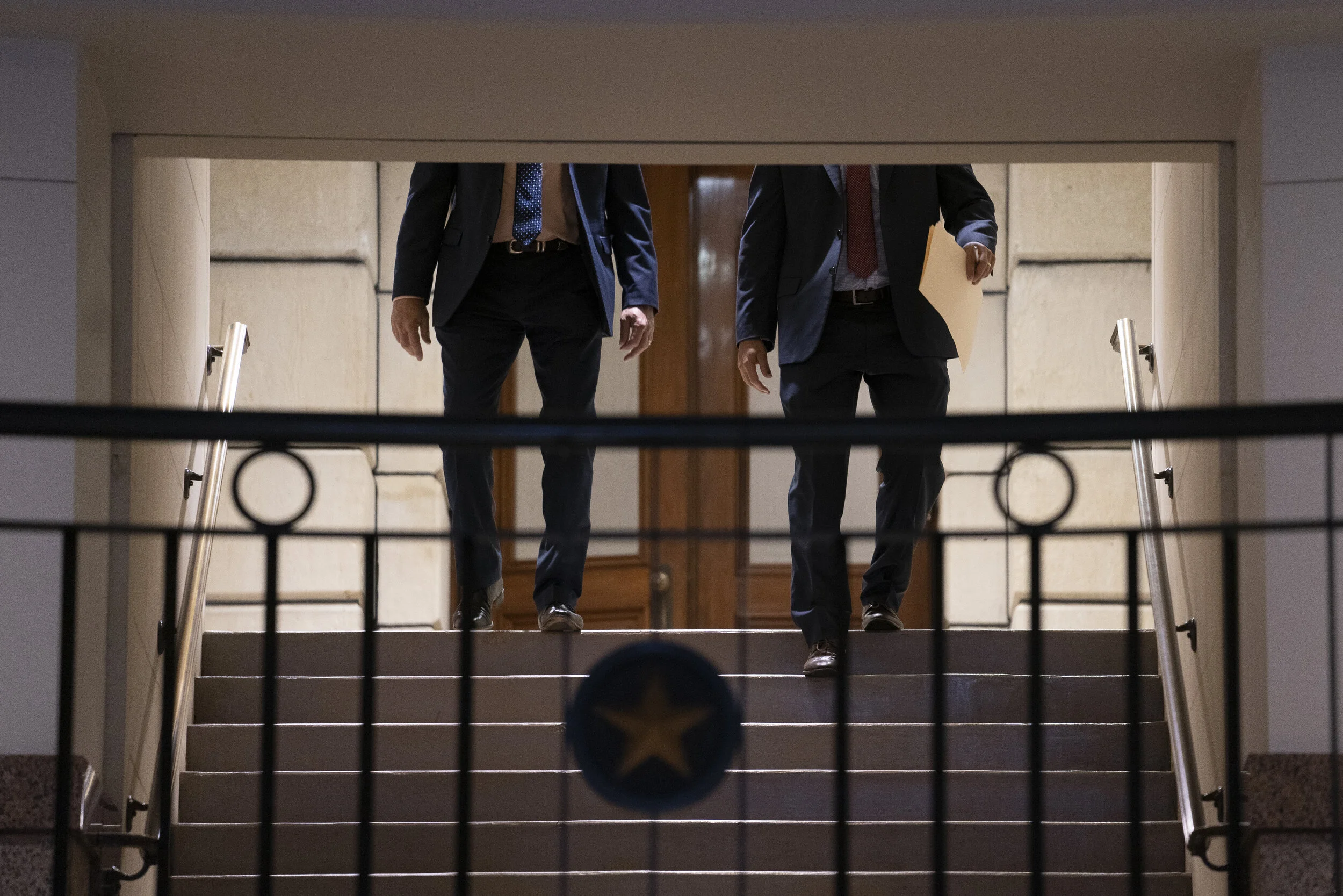  Two Texas legislators enter the Capitol Extension on Aug. 11, 2021. 