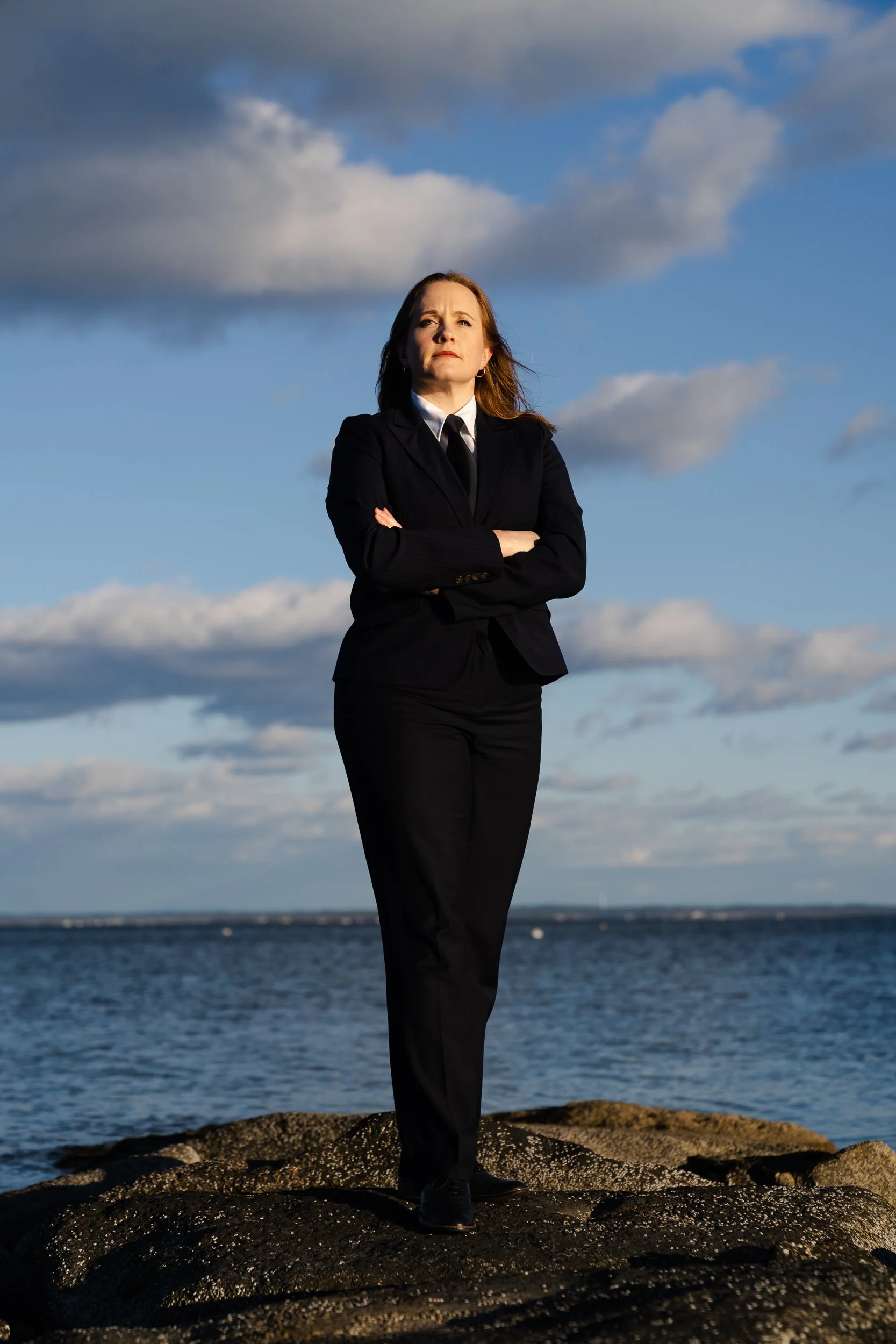 Kate Fredericks, 37, poses for a portrait in Mattapoisett, MA on Dec. 19, 2022. In 2023, Fredericks led a class-action law suit against her former employee, the cargo airline Ameriflight, for a predatory contract that requires new pilots to pay Ameri