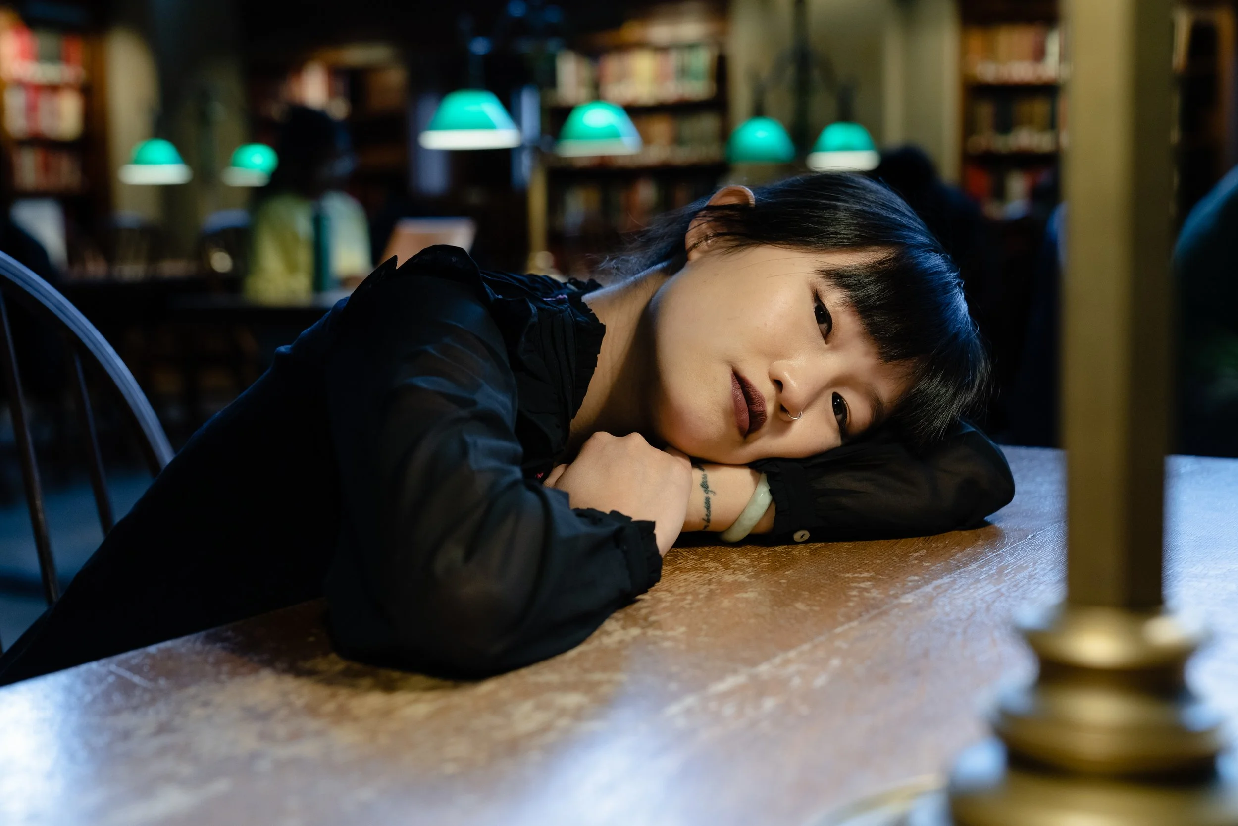  Author Rebecca F. Kuang poses for a portrait at the Boston Public Library in Boston, Mass. on May 2, 2023. In Kuang’s new book “Yellowface,” she draws on her own experiences to tackle issues like cultural appropriation and representation.  