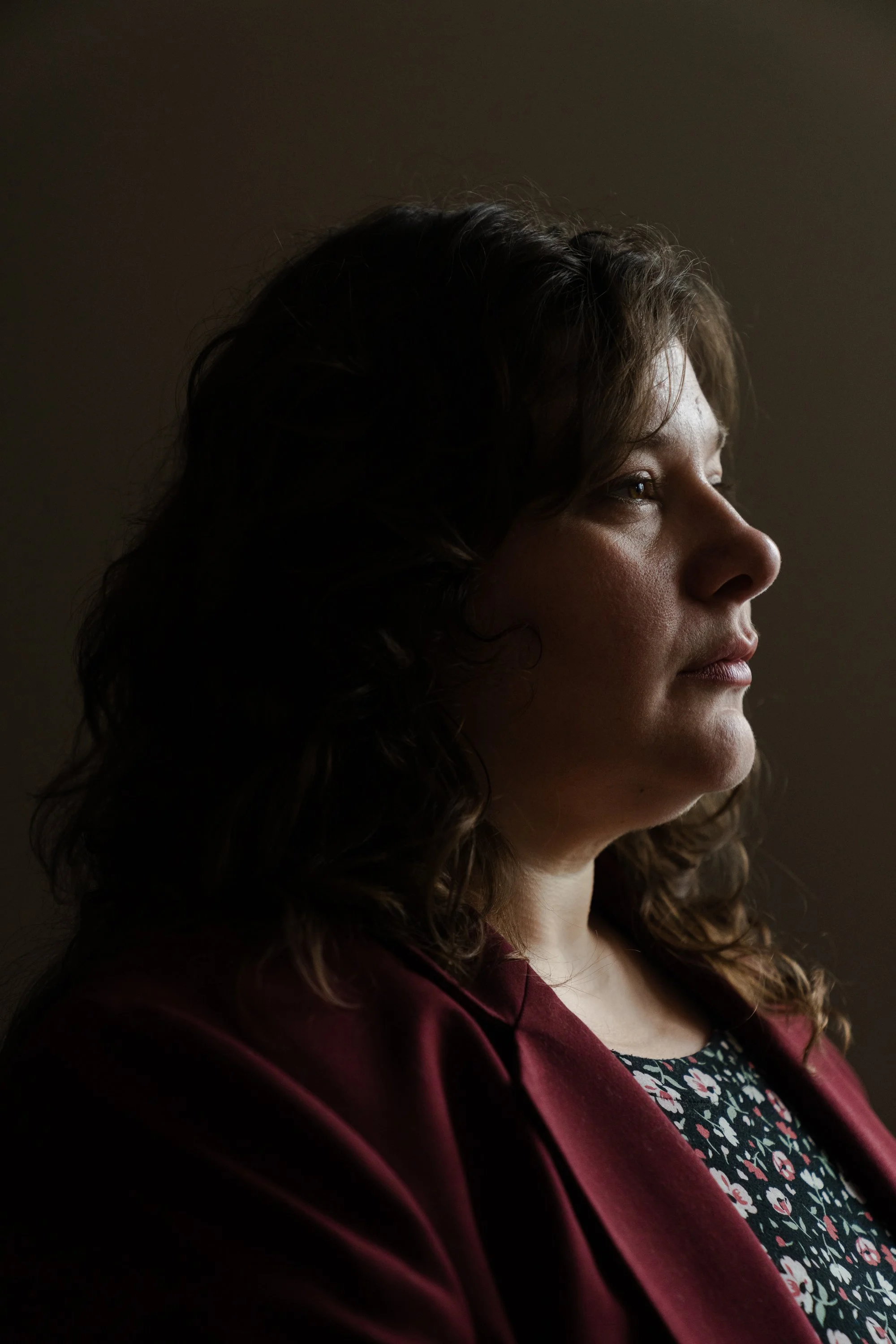  Diane Theriault, a tech lead for Google News whose scathing LinkedIn post about workplace culture went viral recently, poses for a portrait at her home in Waltham, Mass. on Jan. 31, 2024. A promise of yearlong, rolling layoffs have made Google, once