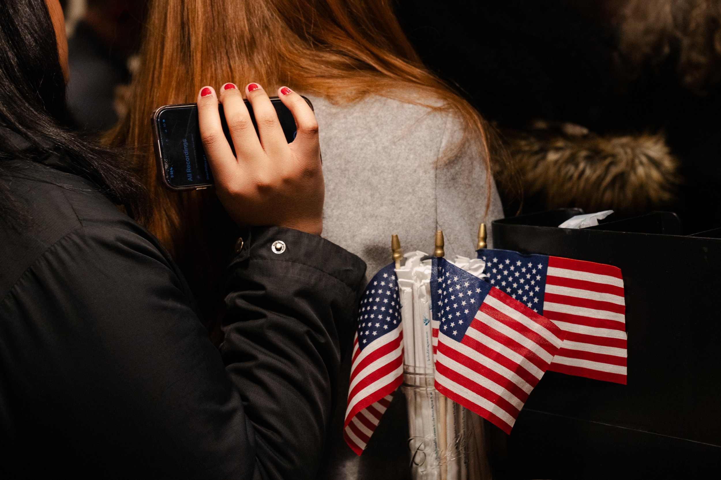  American flags decorate a jar while Congressman Dean Phillips speaks during a campaign event at Brothers Cortado in Concord, NH on Jan. 19, 2024. 