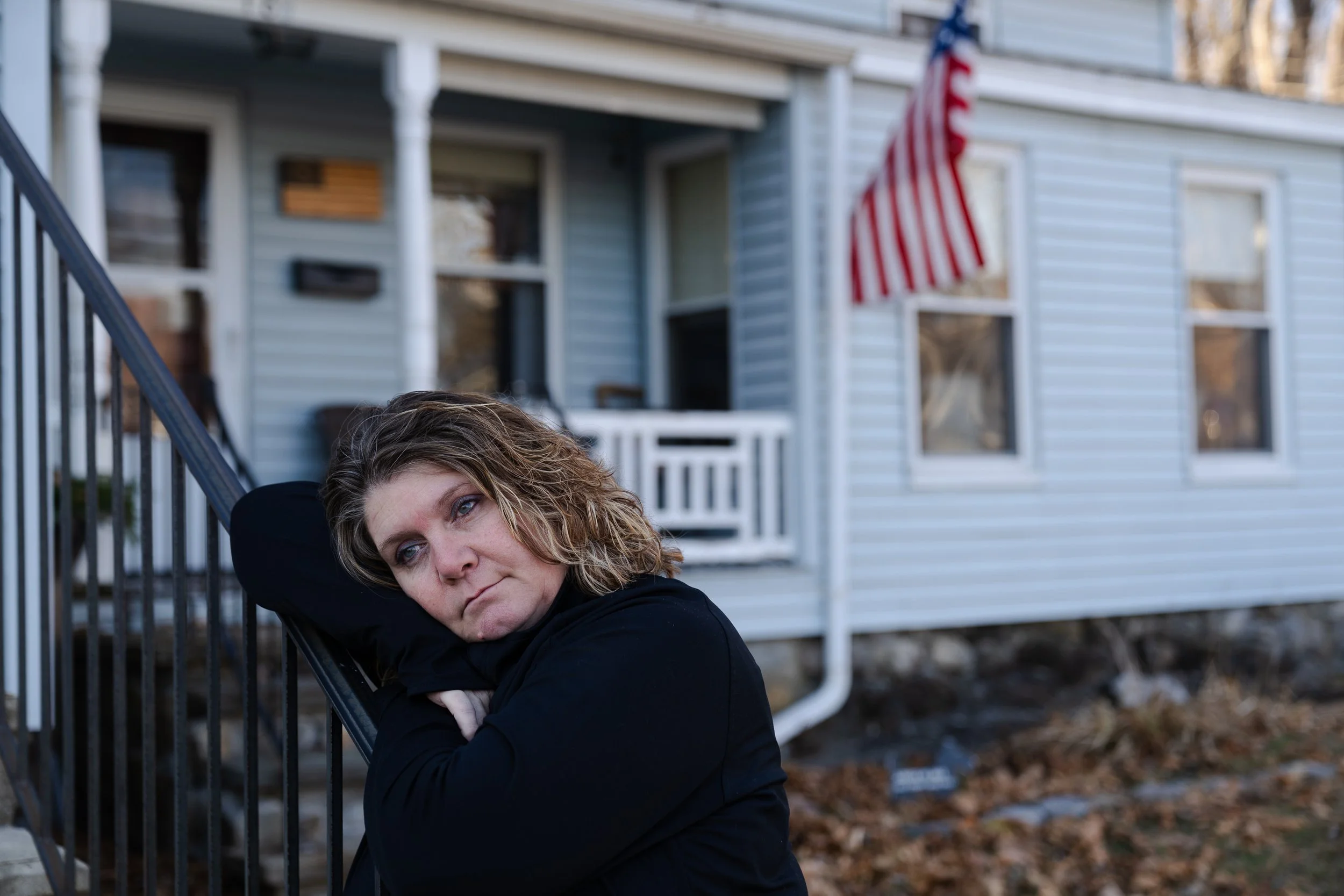  Tracy Carter, 54, poses for a portrait at her home in Maynard, MA on Nov. 30, 2023. Carter, who lost her son to an overdose in 2018, supports the Purdue settlement that will be addressed by the Supreme Court. 