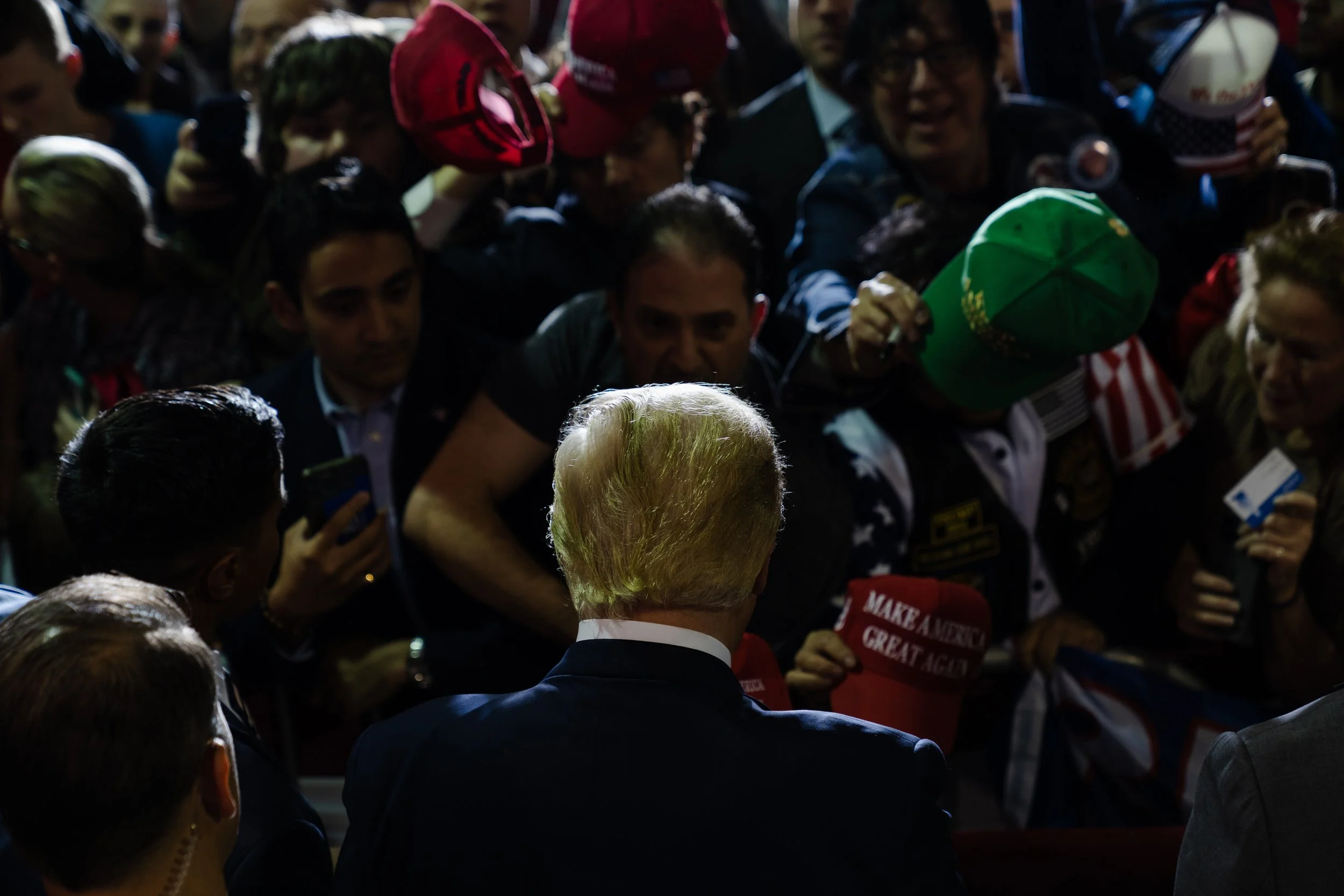  Former president and GOP candidate Donald Trump greets supporters after speaking at a campaign event in Manchester, NH on April 27, 2023. 