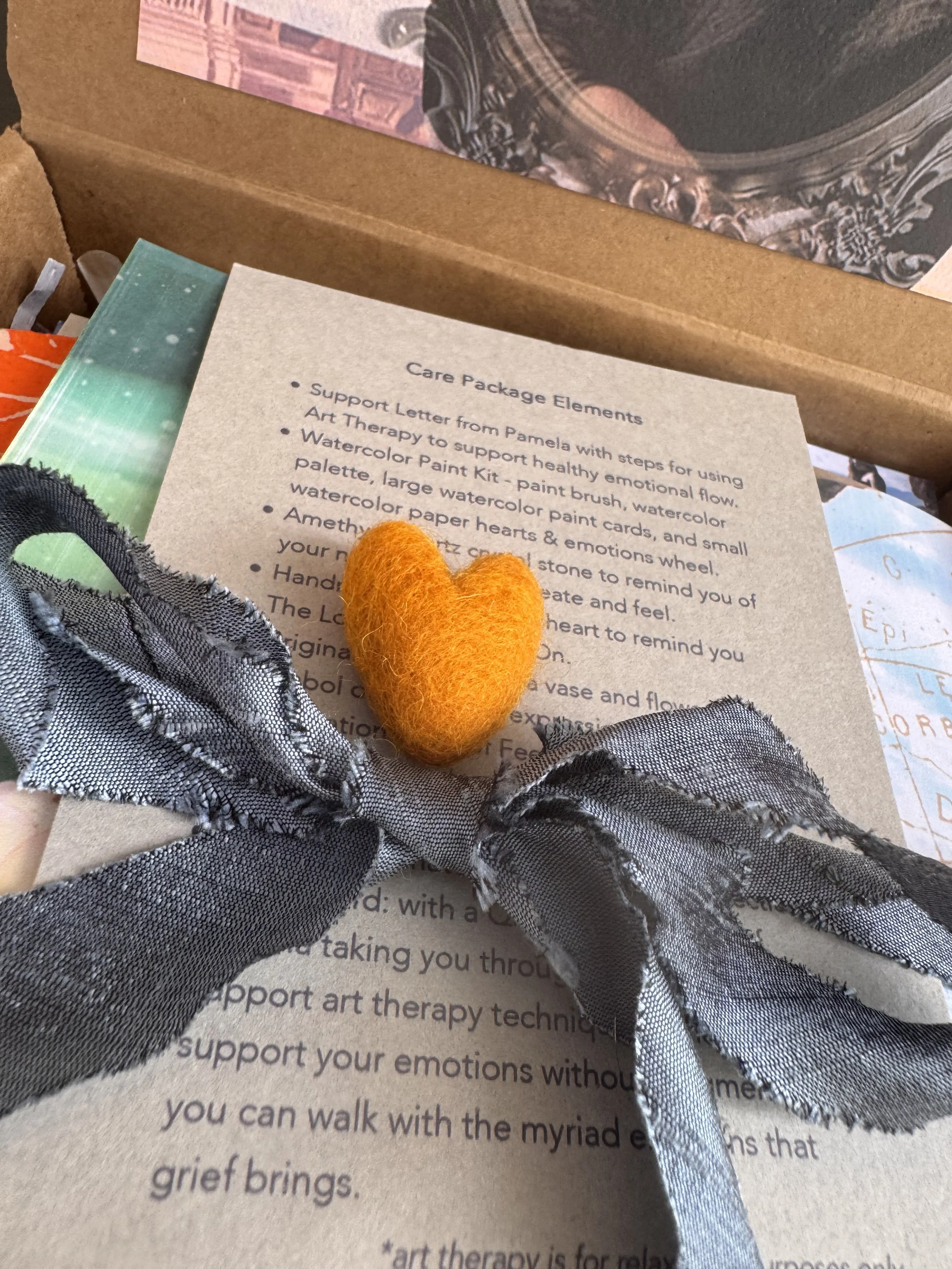 a bounty of grief support in the form of a supportive letter, affirmation card, spotify playlist, guided imagery, talismans and treasures, holistic support activity and elements, and hand crafted artwork to inspire.