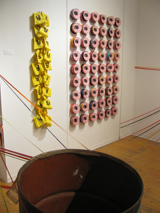  The 'Place Holders' are screen printed ribbon on scalloped card. These were made so that once the ribbons went to the vacant lots for installation, there would not be vacancy in the corner of the gallery. 