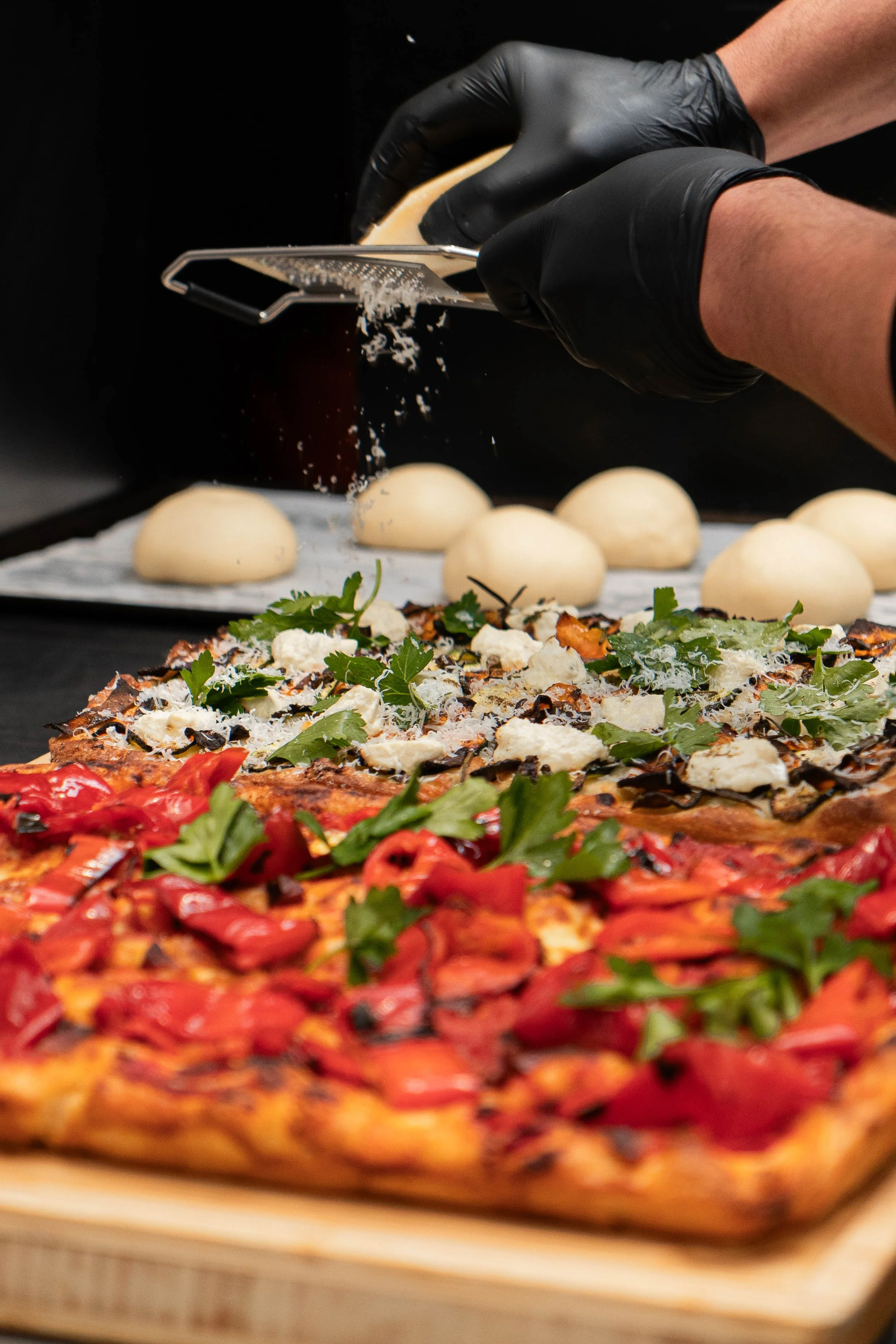 pizza-preparation-grating-cheese.jpg