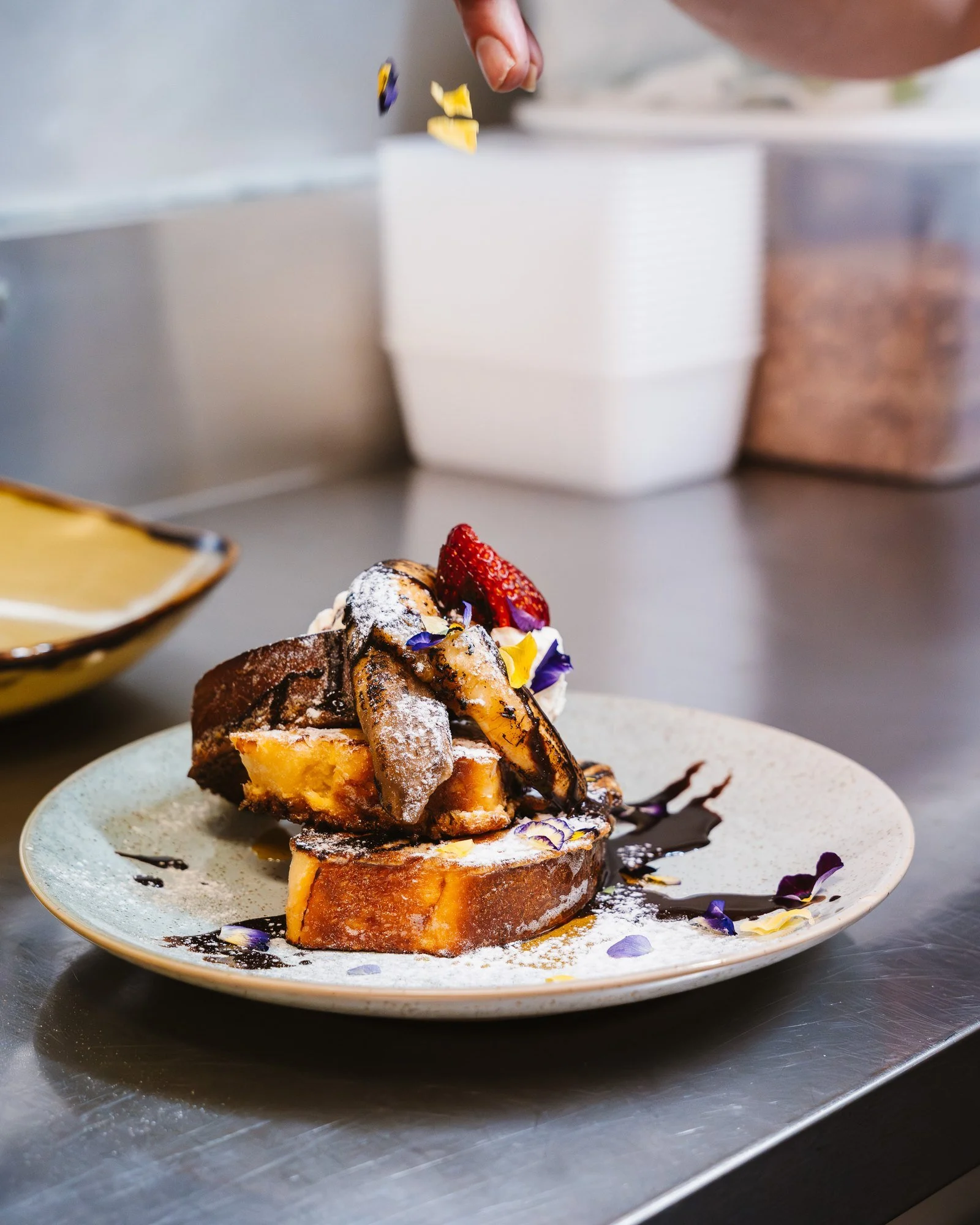 Marché French Toast on house-made brioche with caramelised banana and almond praline