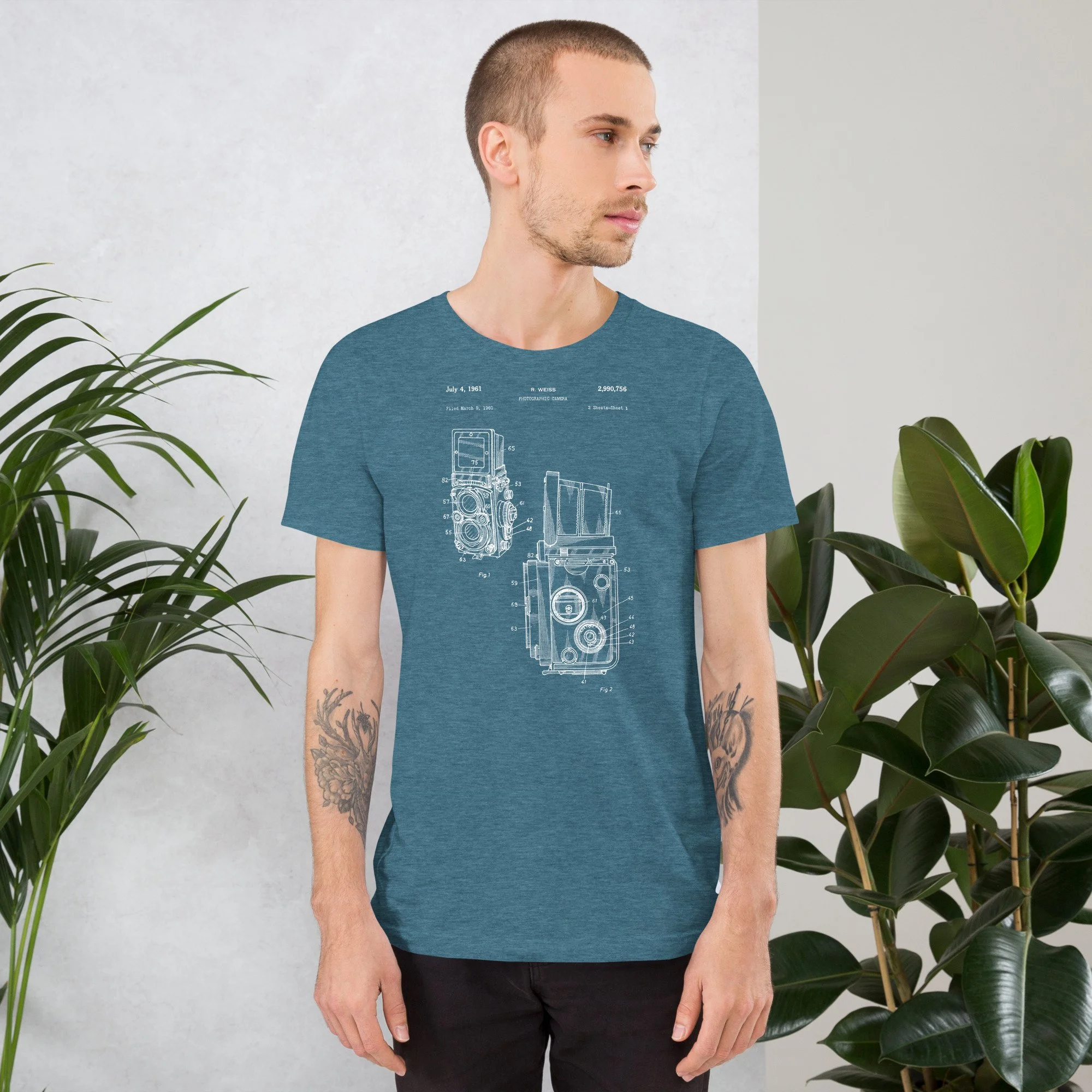 unisex-staple-t-shirt-heather-deep-teal-front-6a56930bbfd81.jpg