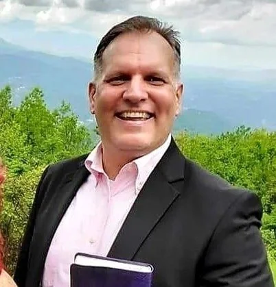 Pastor posing with Bible 