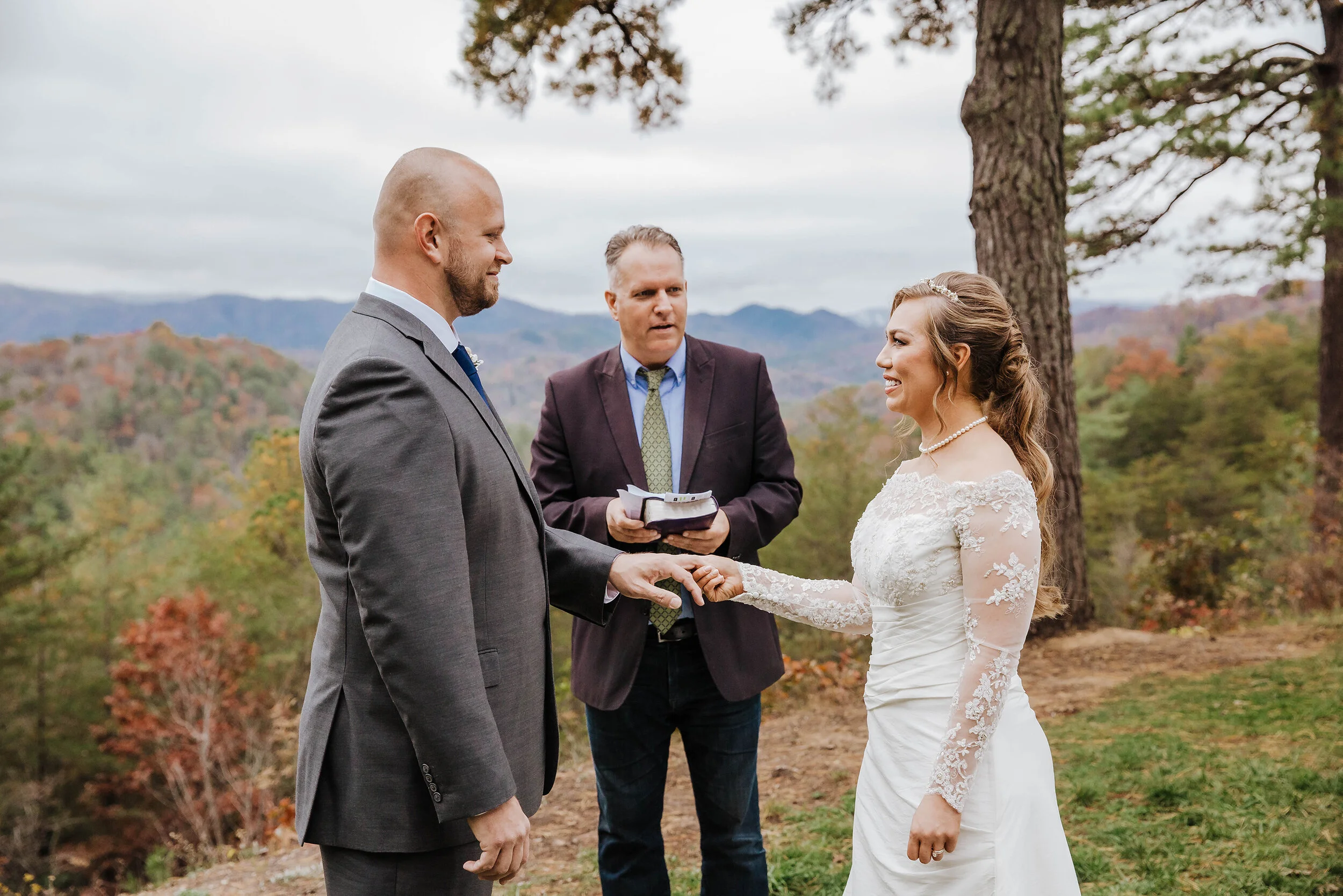 foothills-parkway-gatlinburg-wedding-ceremony-holding-hands.jpg