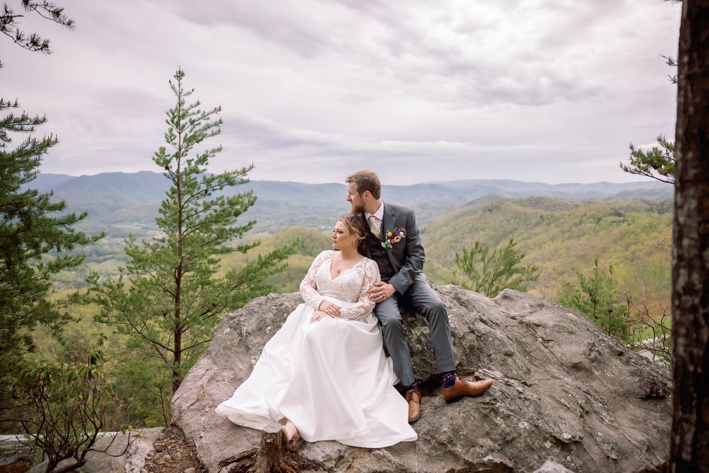 foothills-parkway-bride-and-groom-portrait-on-rock.jpg