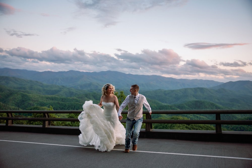 foothils-parkway-elopement-running-bride-and-groom.jpg