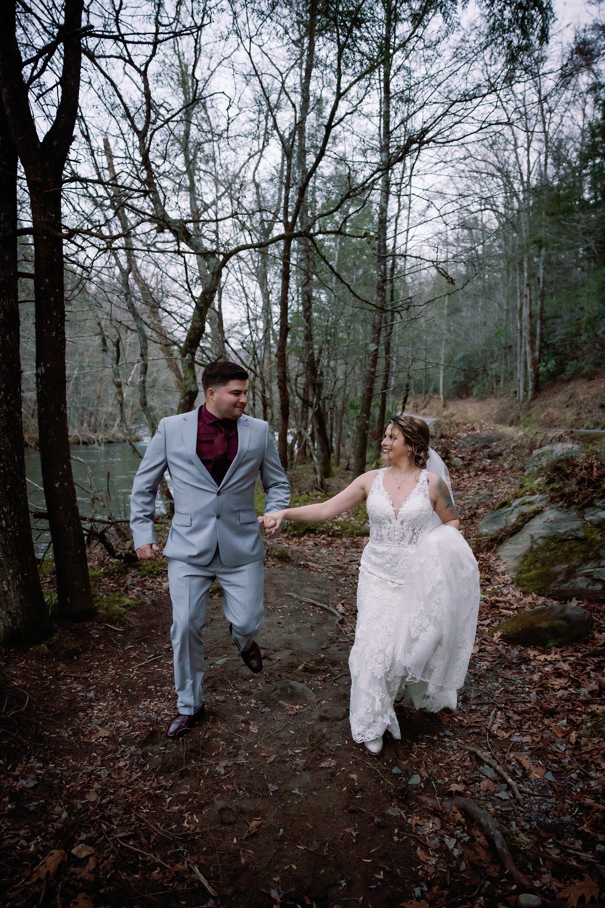greenbrier-elopement-bride-and-groom-running.jpg