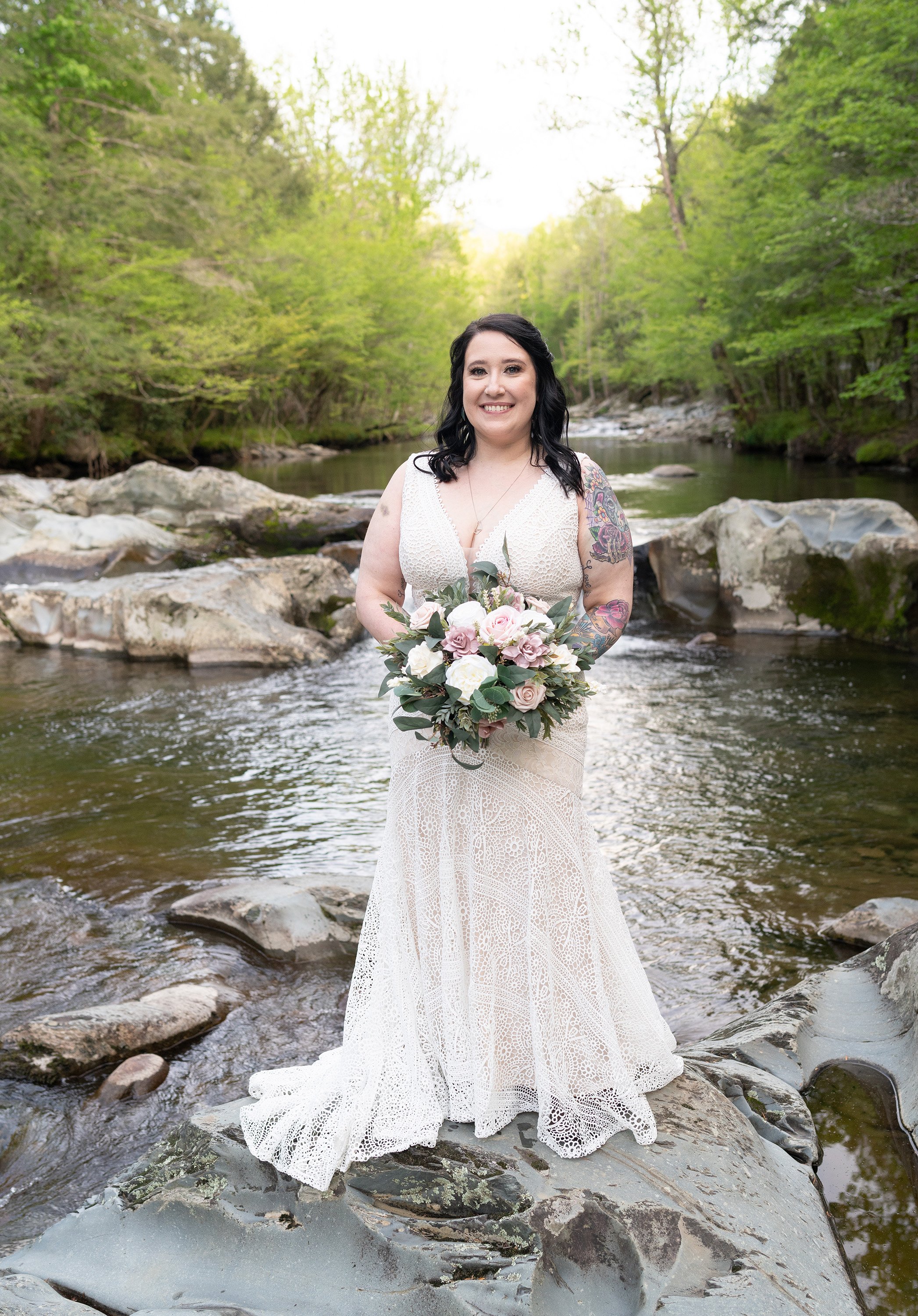 greenbrier-elopement-bride-on-rocks.jpg