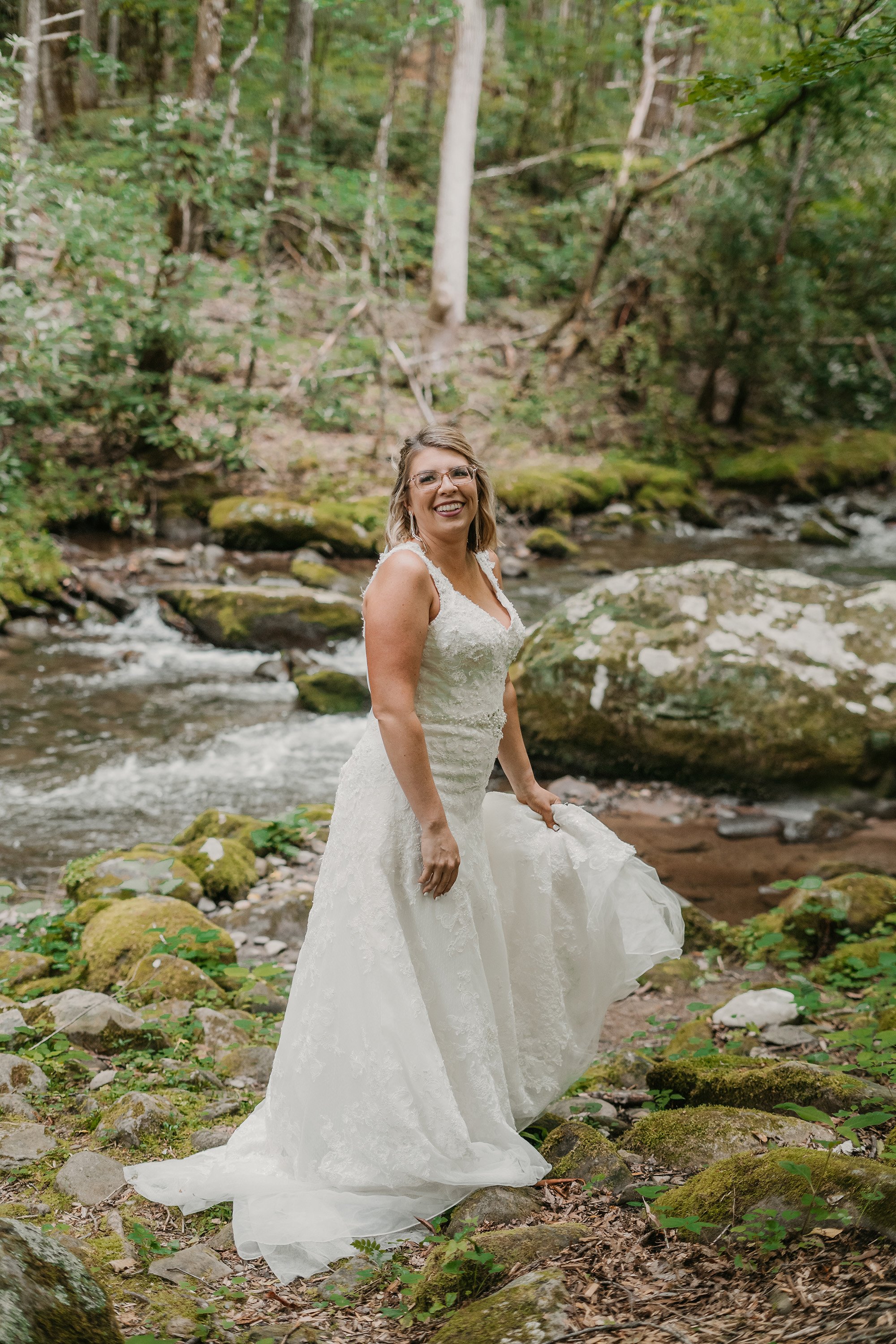 elys-mill-elopement-bride-near-river.jpg